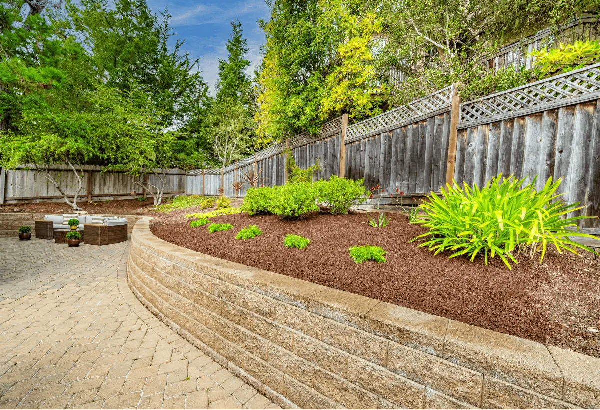 The backyard's landscaped raised level.
