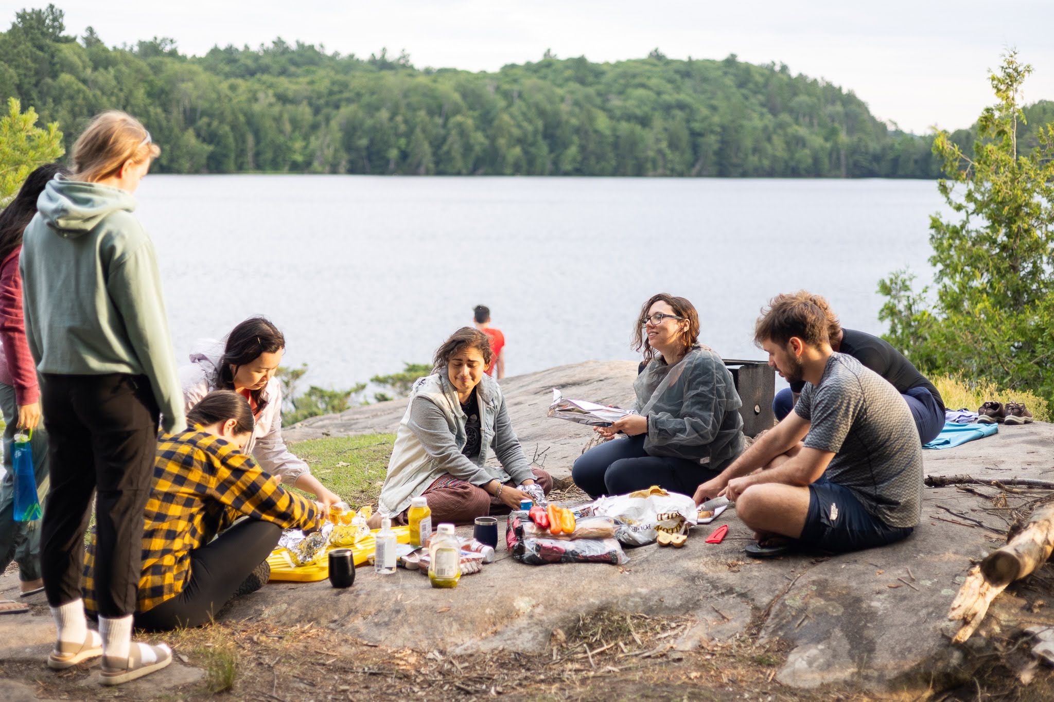 Group backpacking in the wilderness with Wilderness Union flag