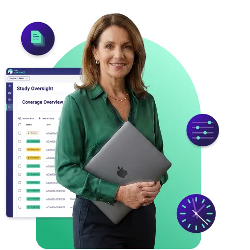an expert holding a computer with eTMF Connect dashboards in the background