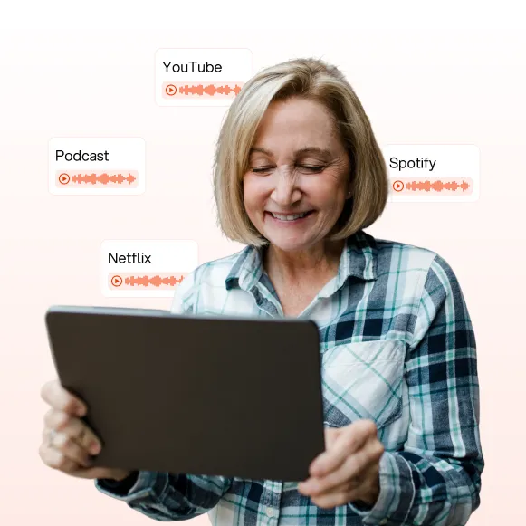 Smiling woman looking at a tablet with icons for YouTube, Podcast, Spotify, and Netflix voice play features around her.