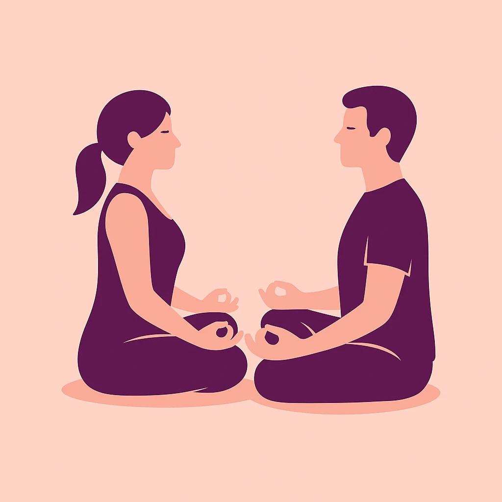 Couple en train de méditer assis face à face