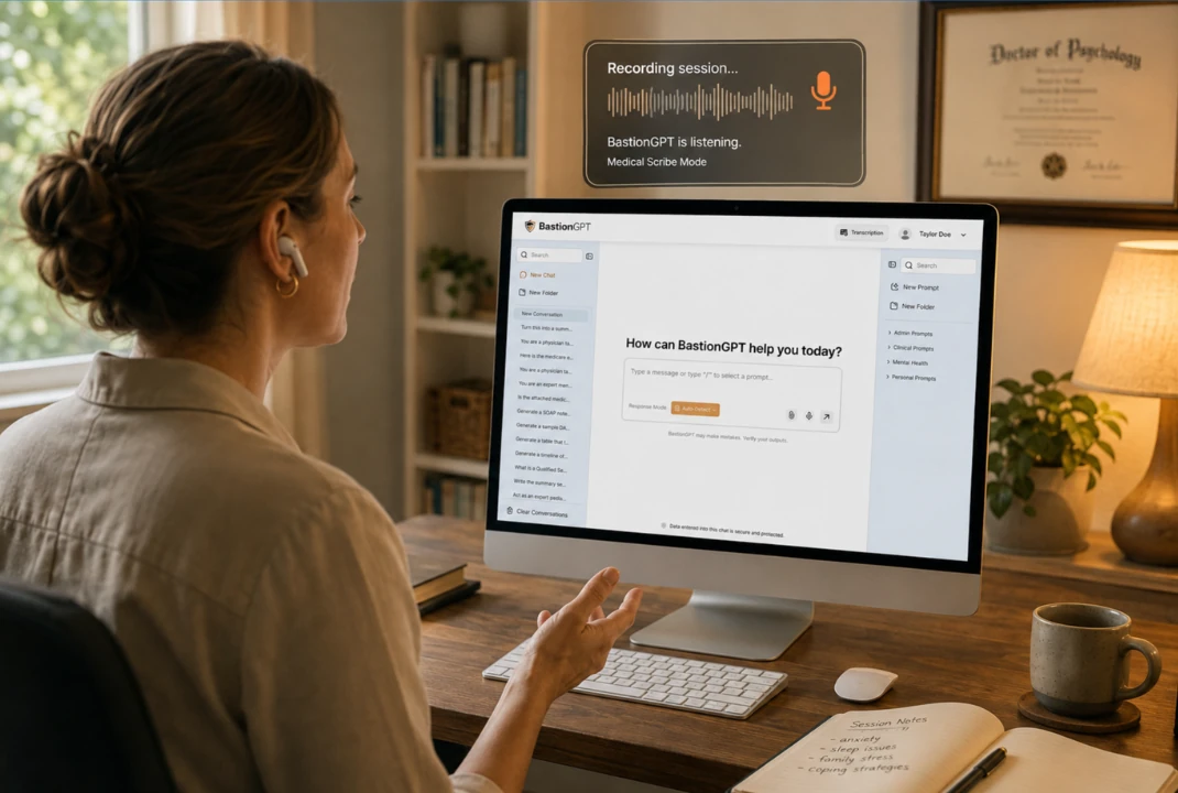 Clinician at a desktop computer using BastionGPT in medical scribe mode, recording a session