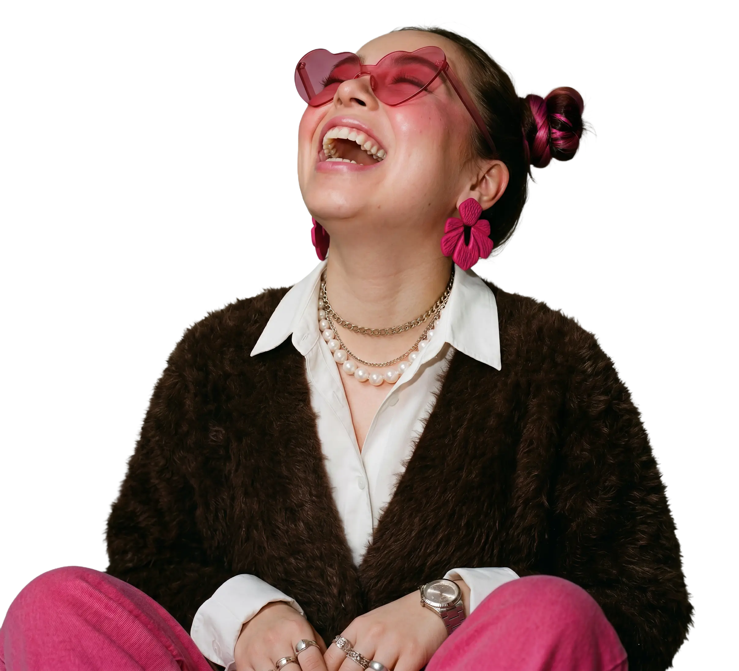 A photo of a woman holding her wallet and smiling due to the daily interest on her savings.