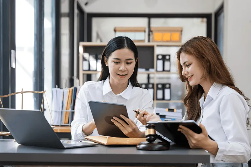 Attorneys review documents on iPad