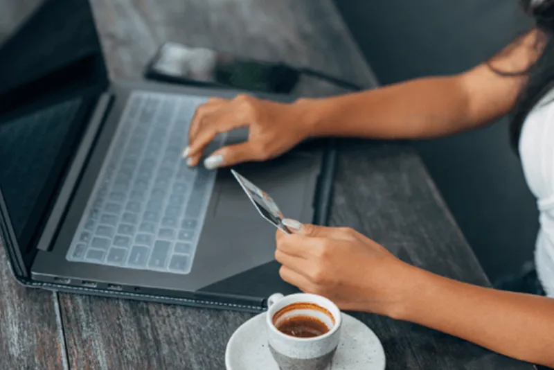 woman paying her legal bills on a payment plan online with a credit card