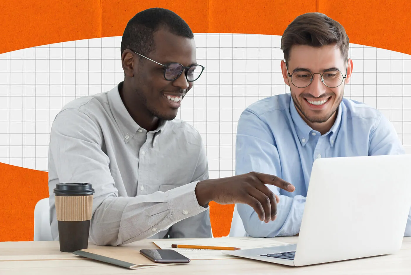 A woman with brown shoulder-length hair wearing a long sleeve orange sweater writes in a notebook in front of an open laptop