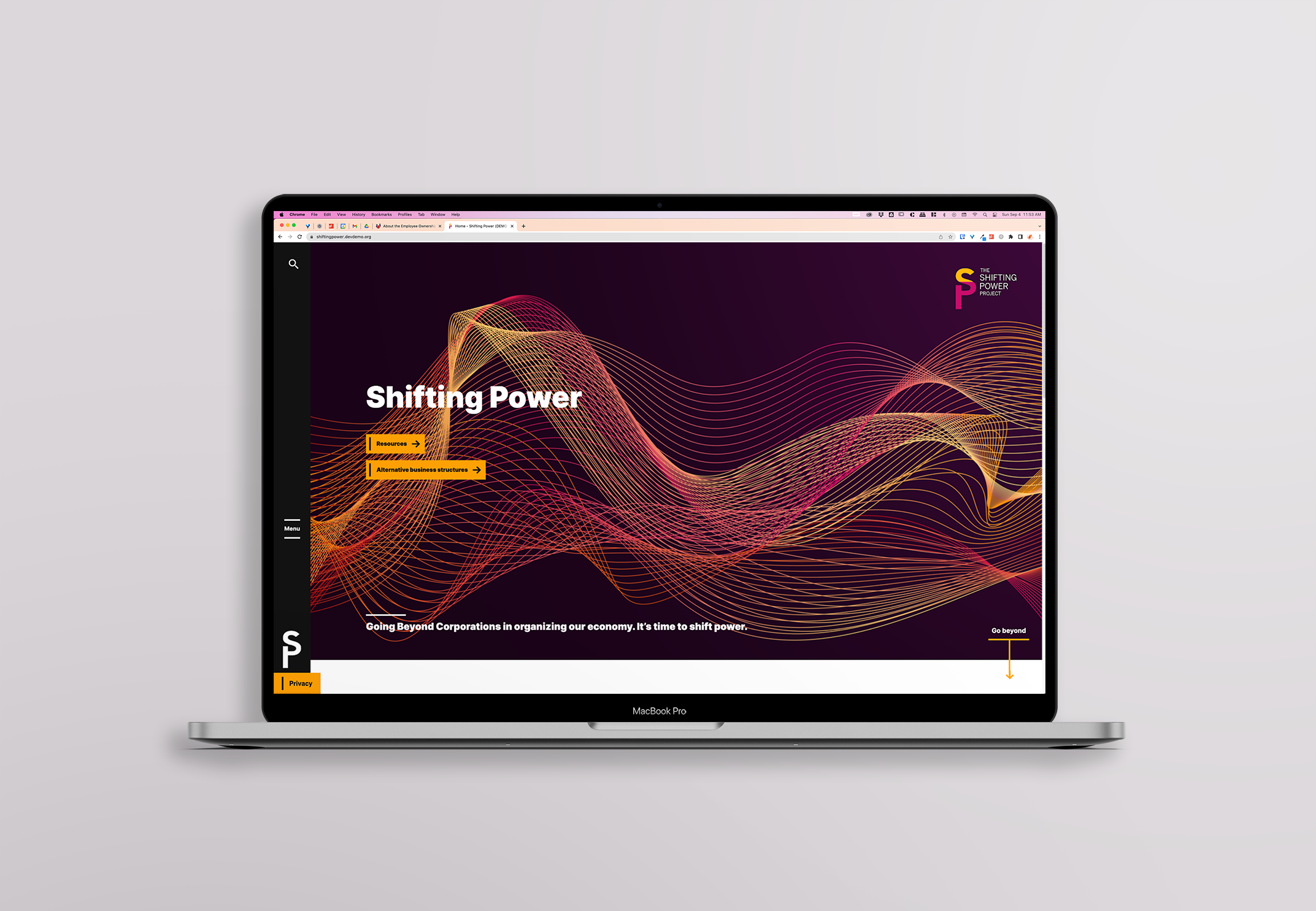 Mockup of The Shifting Power Project website on laptop