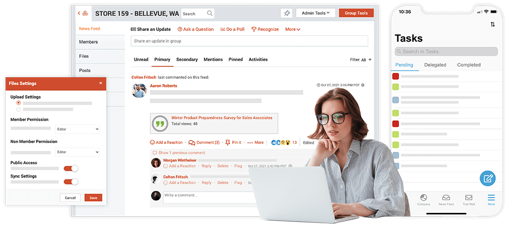 Woman wearing glasses working on a laptop with a collaborative workspace and mobile task management app displayed in the background.