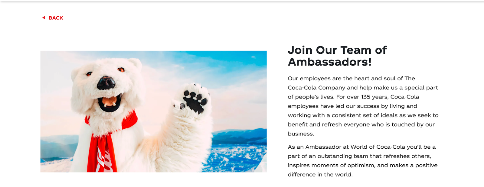 Promotional webpage featuring Coca-Cola’s polar bear mascot waving with a red scarf. 