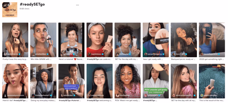 Grid of TikTok creators showcasing beauty routines using Laura Mercier products under the branded hashtag #readySETgo, each video featuring influencers applying makeup.