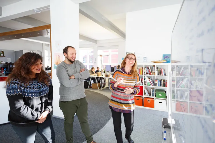 Having fun at the whiteboard – naturally. ;)