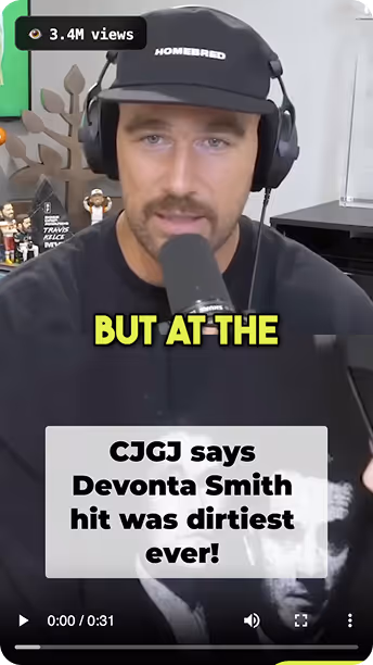Vertical podcast clip of a man wearing headphones and speaking into a microphone, with text overlay: 'CJGJ says Devonta Smith hit was dirtiest ever!' The view count label reads 3.4M views.