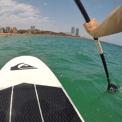 Paddleboarding off the beach of Barcelona