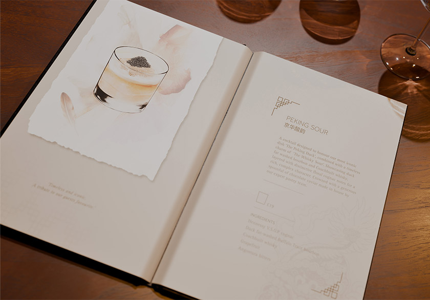 Open Hakkasan cocktail menu designed by Knockout, showing a Peking Sour illustration alongside English and Chinese text on cream-coloured pages.