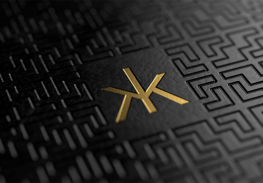 Close-up of the bespoke Hakkasan cocktail menu cover designed by Knockout, showing a gold logo framed by an intricate black lattice texture inspired by the restaurant’s signature wooden screens.