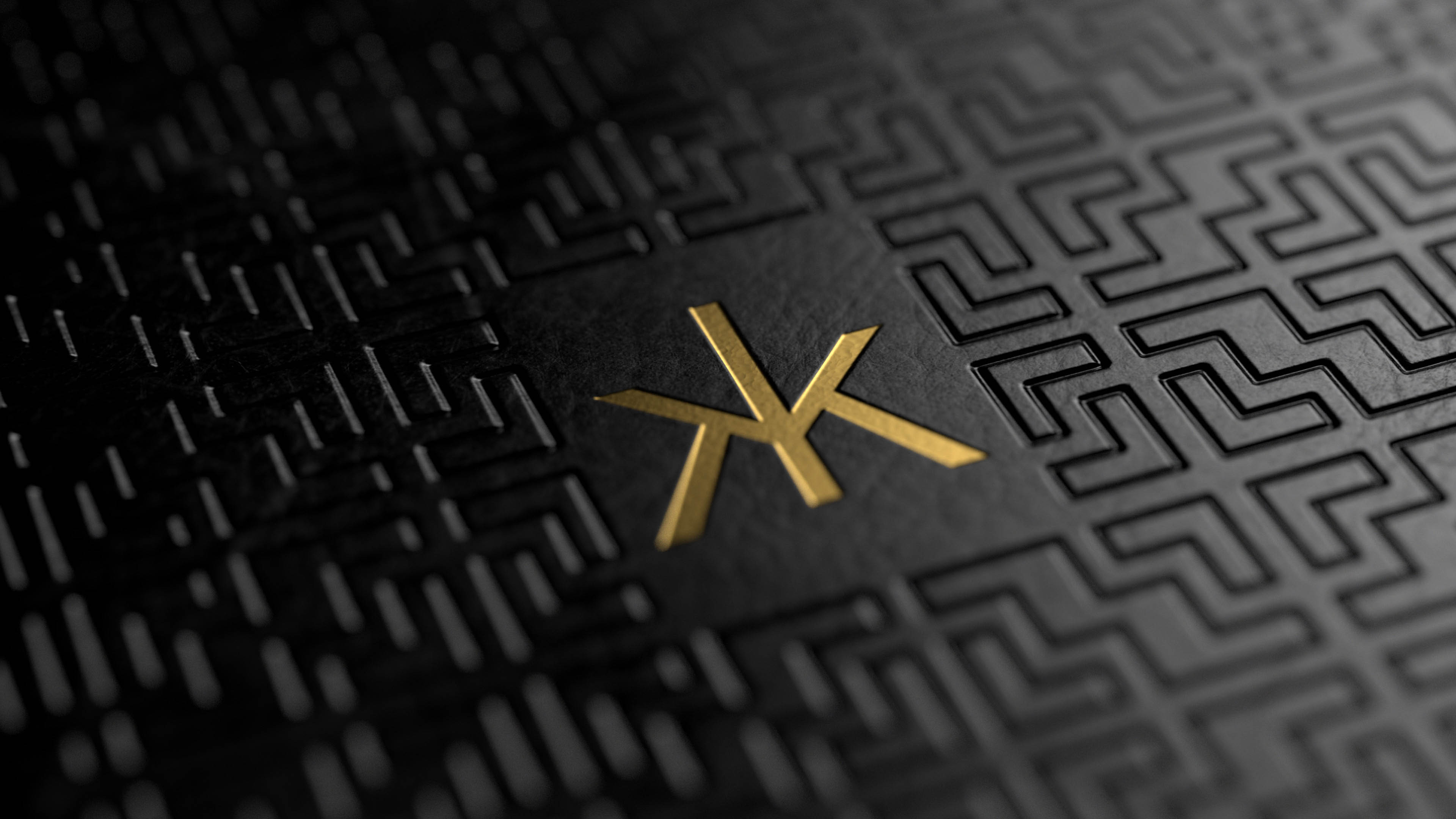 Close-up of the bespoke Hakkasan cocktail menu cover designed by Knockout, showing a gold logo framed by an intricate black lattice texture inspired by the restaurant’s signature wooden screens.