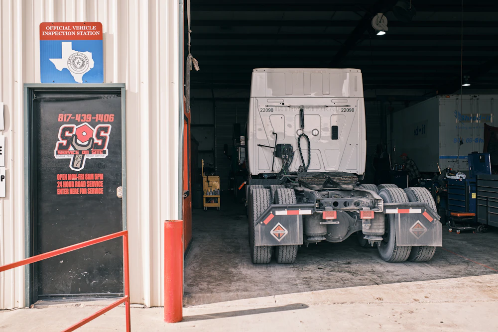Semi truck in shop for repairs at SOS Truck & Trailer Repair