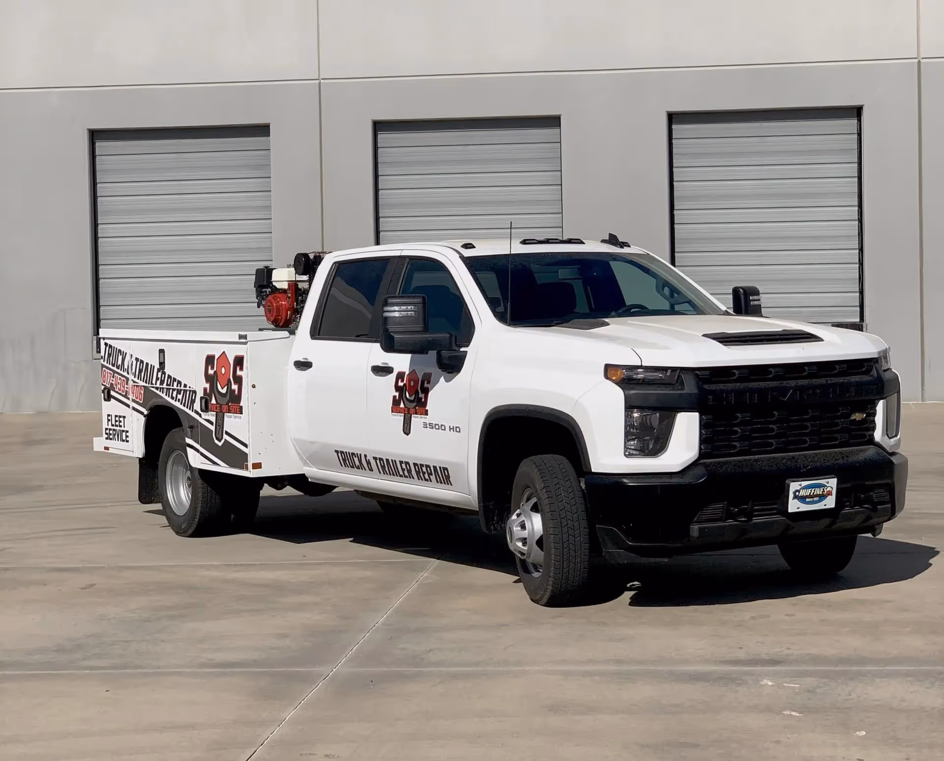 Mechanic performing mobile truck and trailer repairs from SOS Truck & Trailer Repair