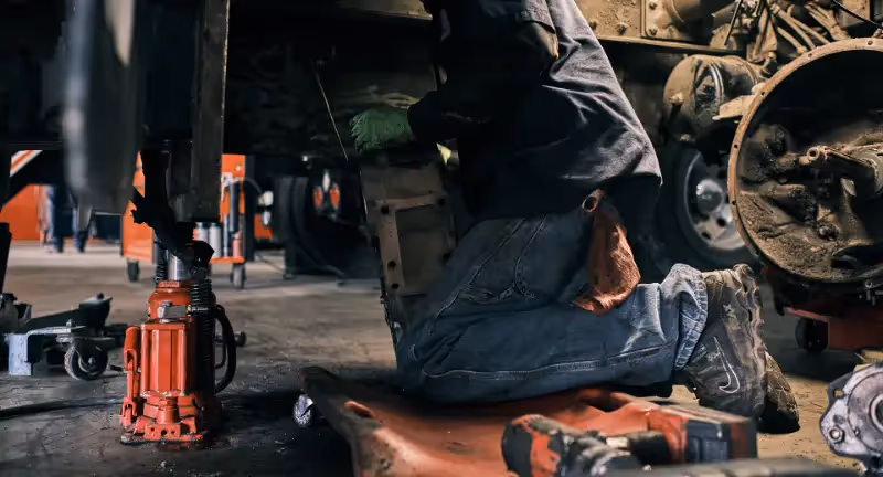 Mechanic performing truck and trailer modifications from SOS Truck & Trailer Repair