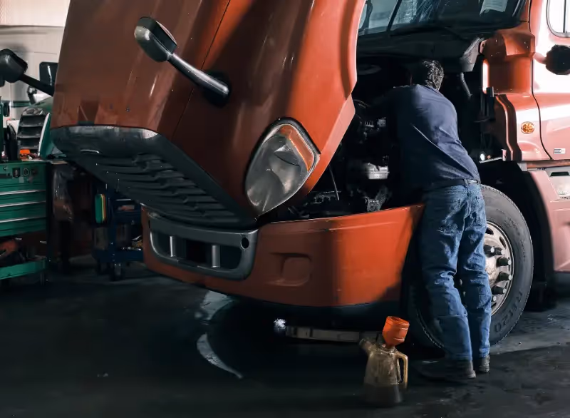 Mechanic performing truck preventive maintenance from SOS Truck & Trailer Repair