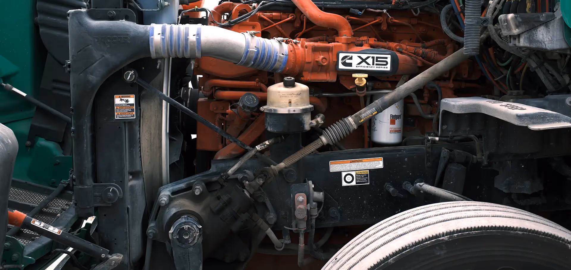 Mechanic performing truck HVAC system repair from SOS Truck & Trailer Repair