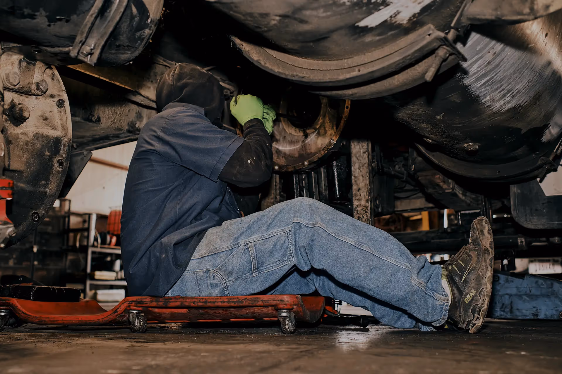 Mechanic performing truck EGR and DPF service from SOS Truck and Trailer Repair