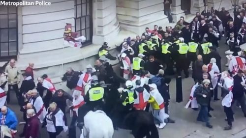 POLICE DEPLOYED IN RIOT GEAR AFTER VIOLENCE ERUPTS DURING ST. GEORGE'S DAY EVENT IN CENTRAL LONDON