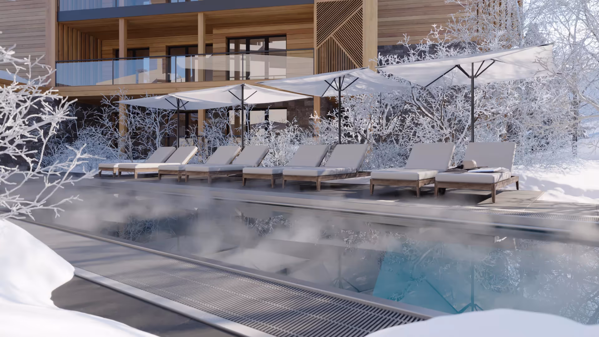 Beheizter Außenpool mit Liegen im Winter in alpiner Ferienimmobilie