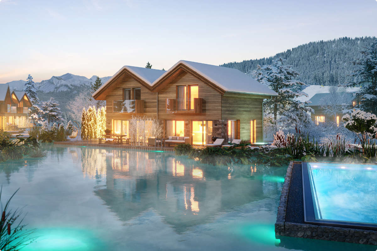 Sonnenchalets Murau im Winter – Naturpool und beheizter Infinity-Pool bei Abendstimmung in der Steiermark