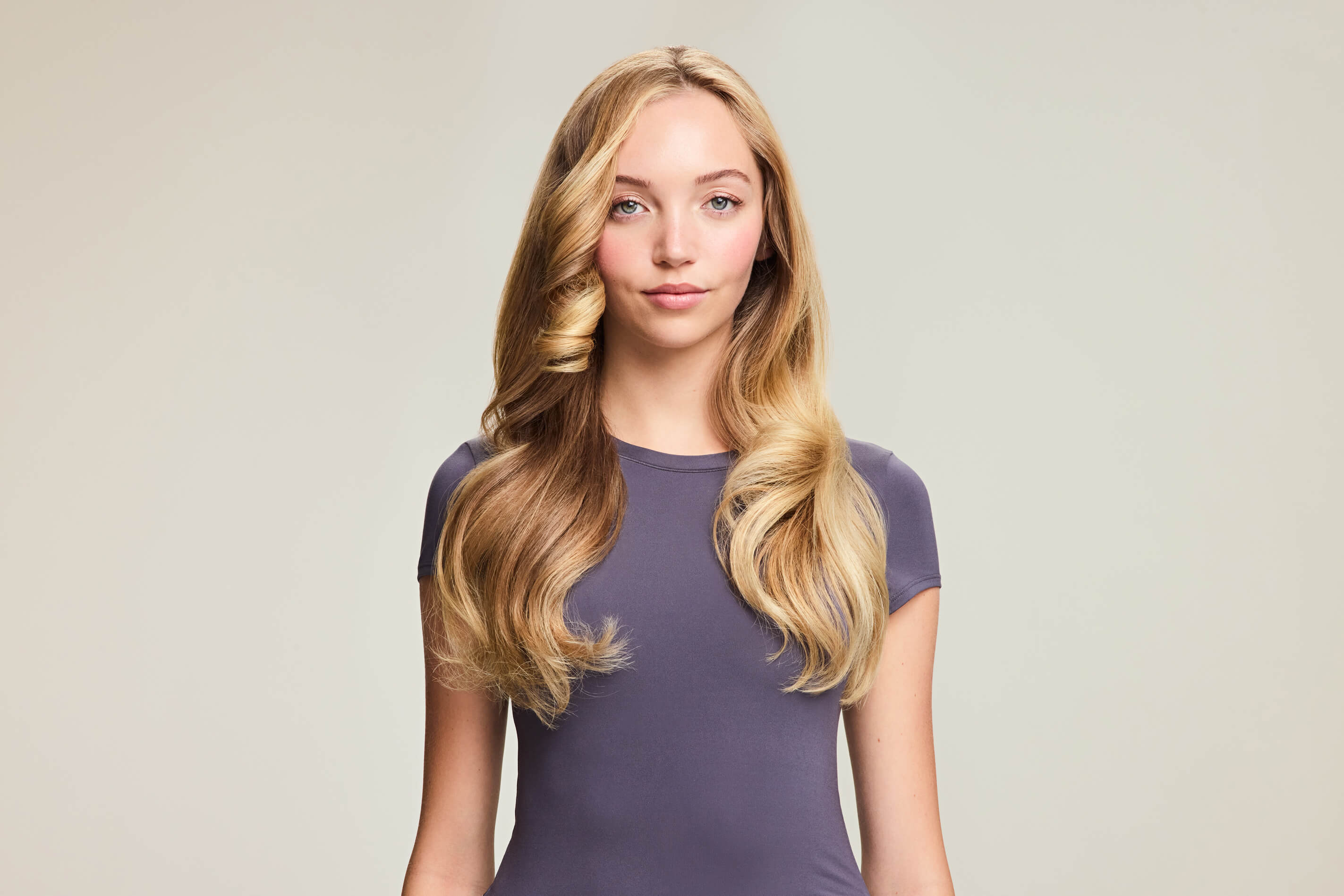 Image 6: Beauty portrait of model with glossy styled hair from Shark Beauty campaign, retouched by GentleRetouch.