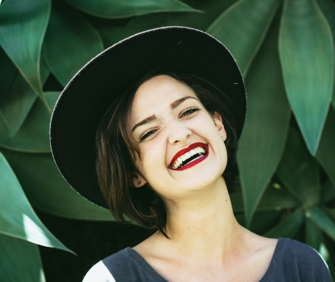 Lady smiling with red lipstick