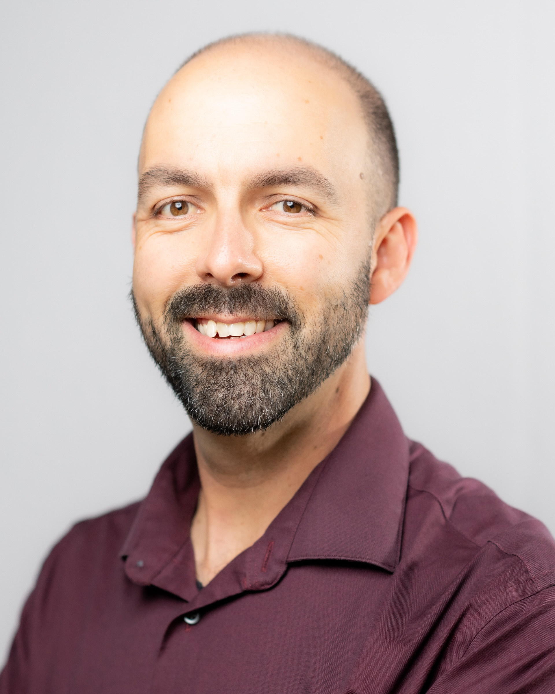 Headshot of Adam Loraine