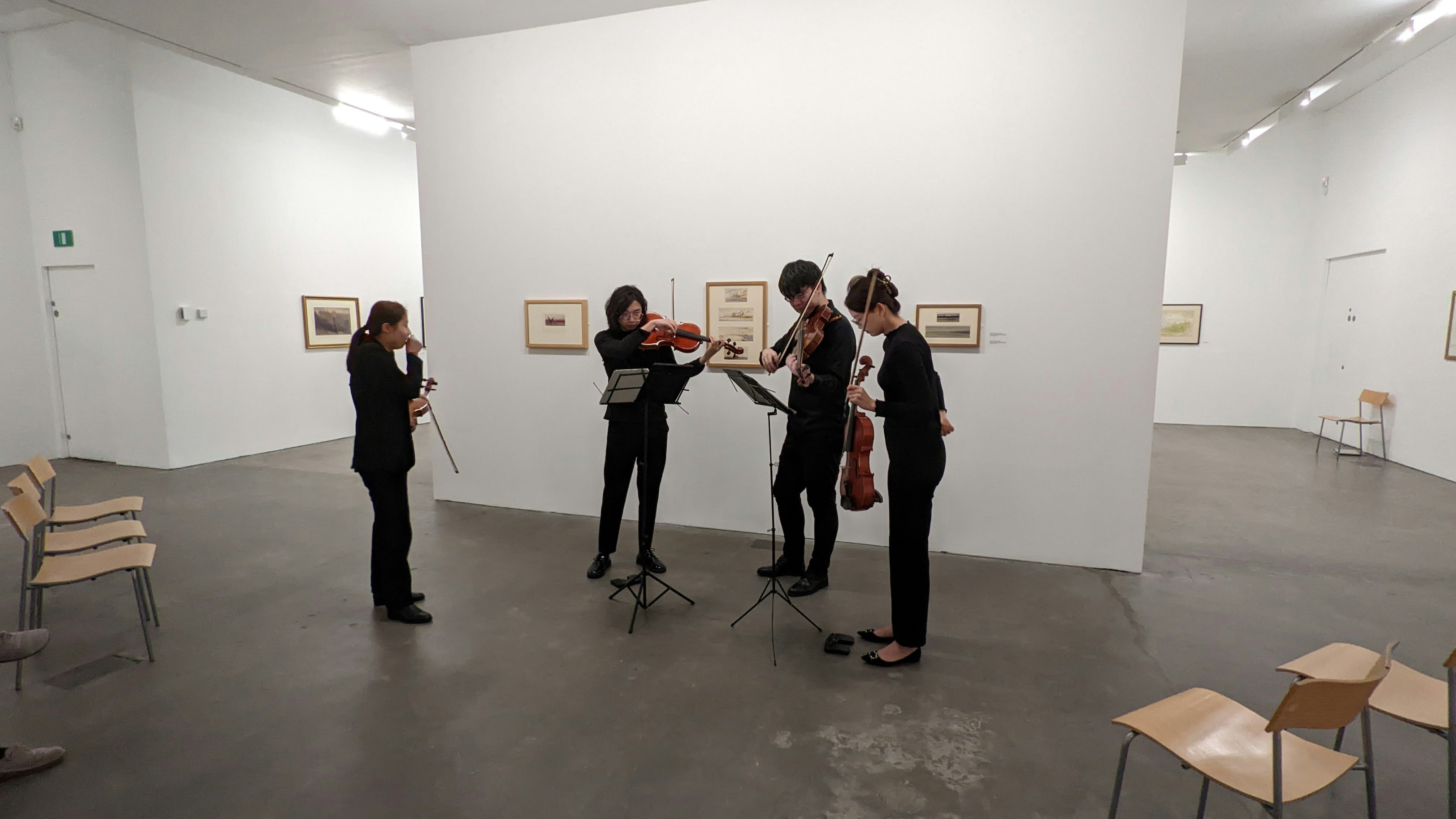 Professional movers handling a delicate art piece