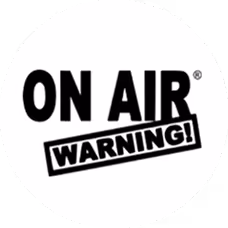 Black text reading 'ON AIR' with a rectangular box below containing 'WARNING!' on a white circular background.