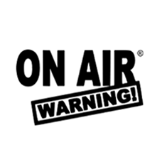 Black text reading 'ON AIR' with a rectangular box below containing 'WARNING!' on a white circular background.