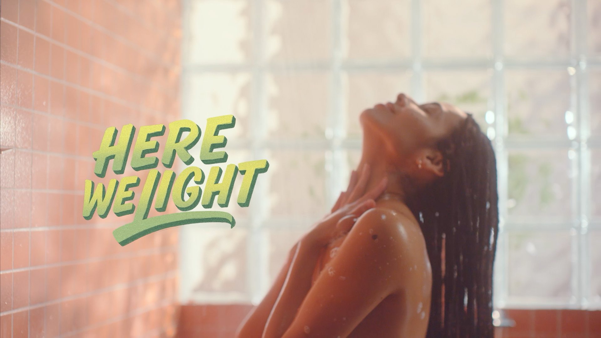 Here we light, a woman rinsing her hair