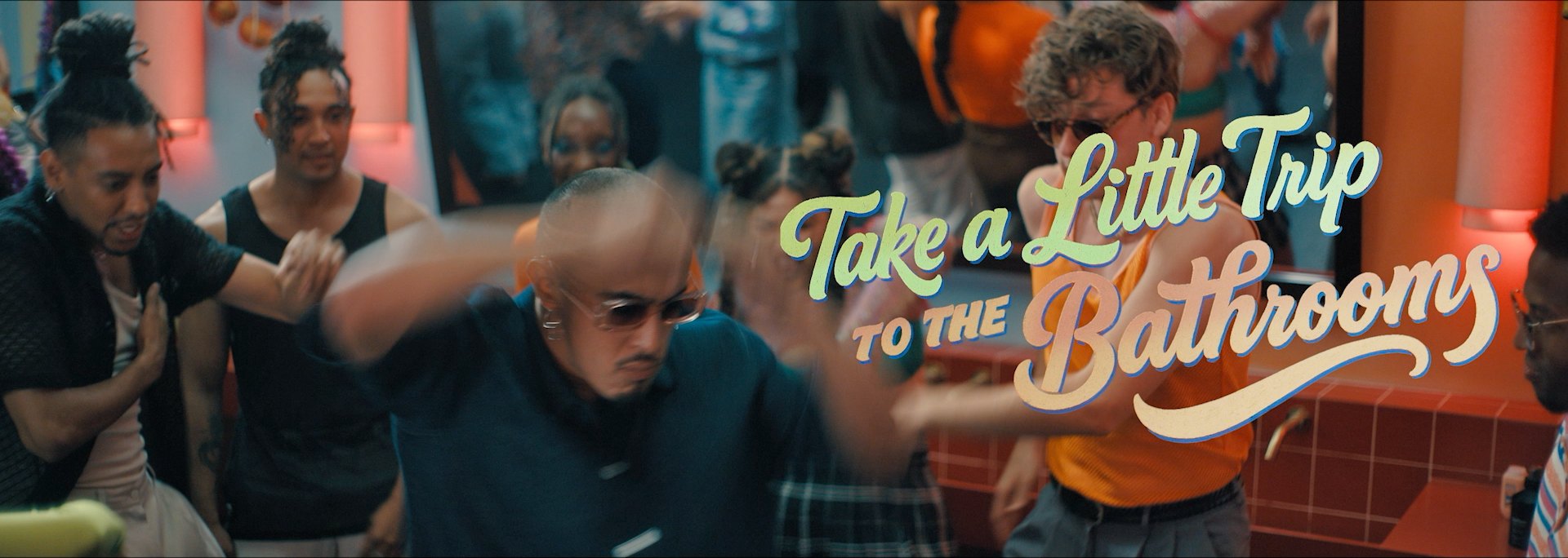 Take a little trip to the bathrooms, a crowd dancing