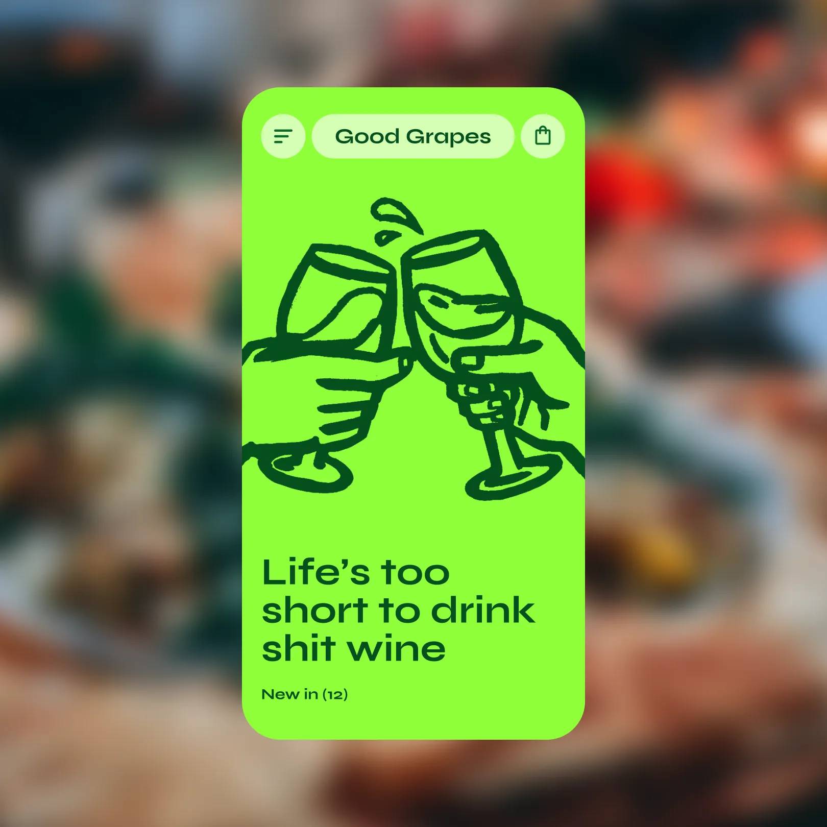 A screenshot of the Good Grapes website on a mobile phone with a blurred background image