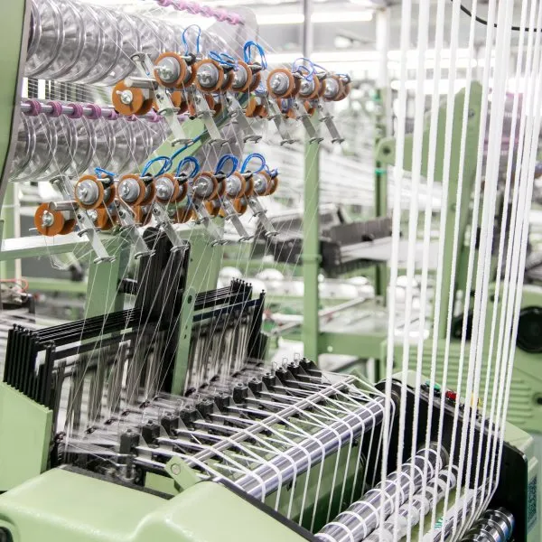 A needle loom weaving laces