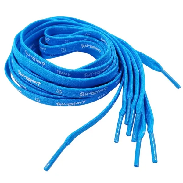 Close up of shoelace tips formed with tipping film