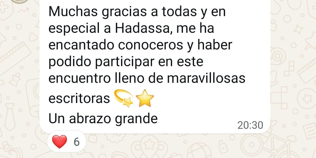 Spanish message thanking Hadassa and others for a wonderful writers' meeting, with heart reactions.