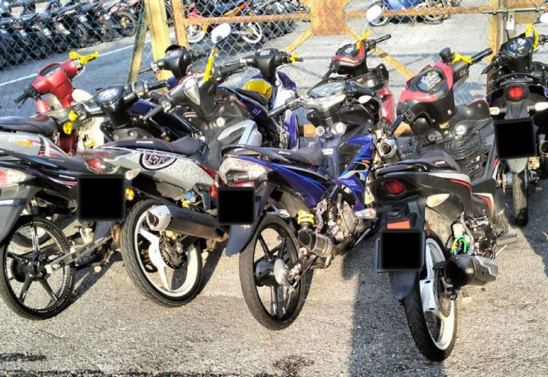 Impounded illegally modified motorbikes with tayar sotong