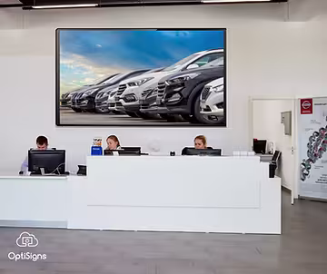 Digital signage in the main lobby of a car dealership