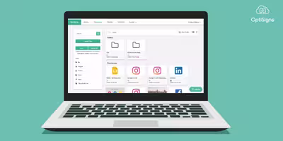 Laptop with OptiSigns Digital Signage Software app open