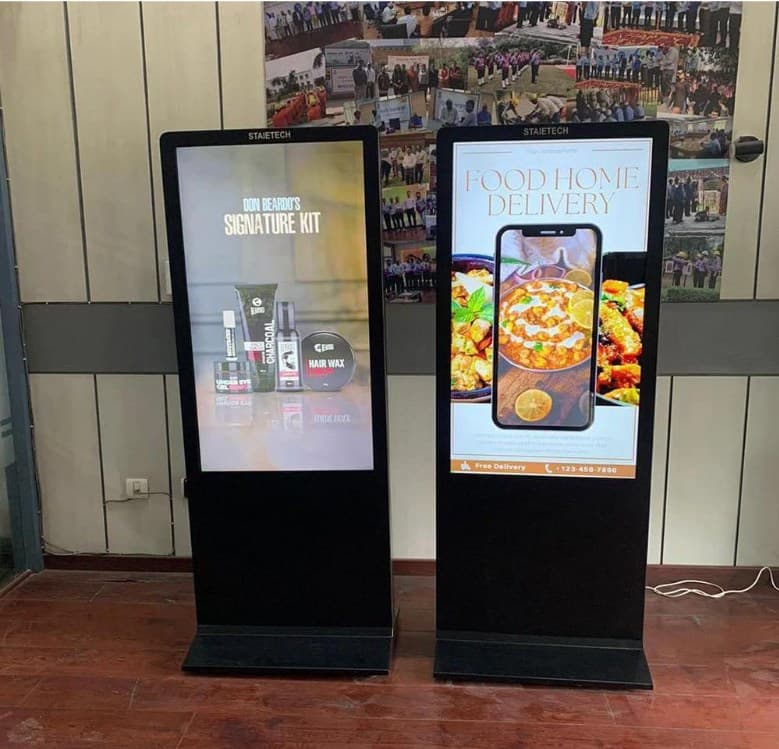 Two dynamic signs depicting product displays. One showcases a food delivery service, while the other shows haircare products.