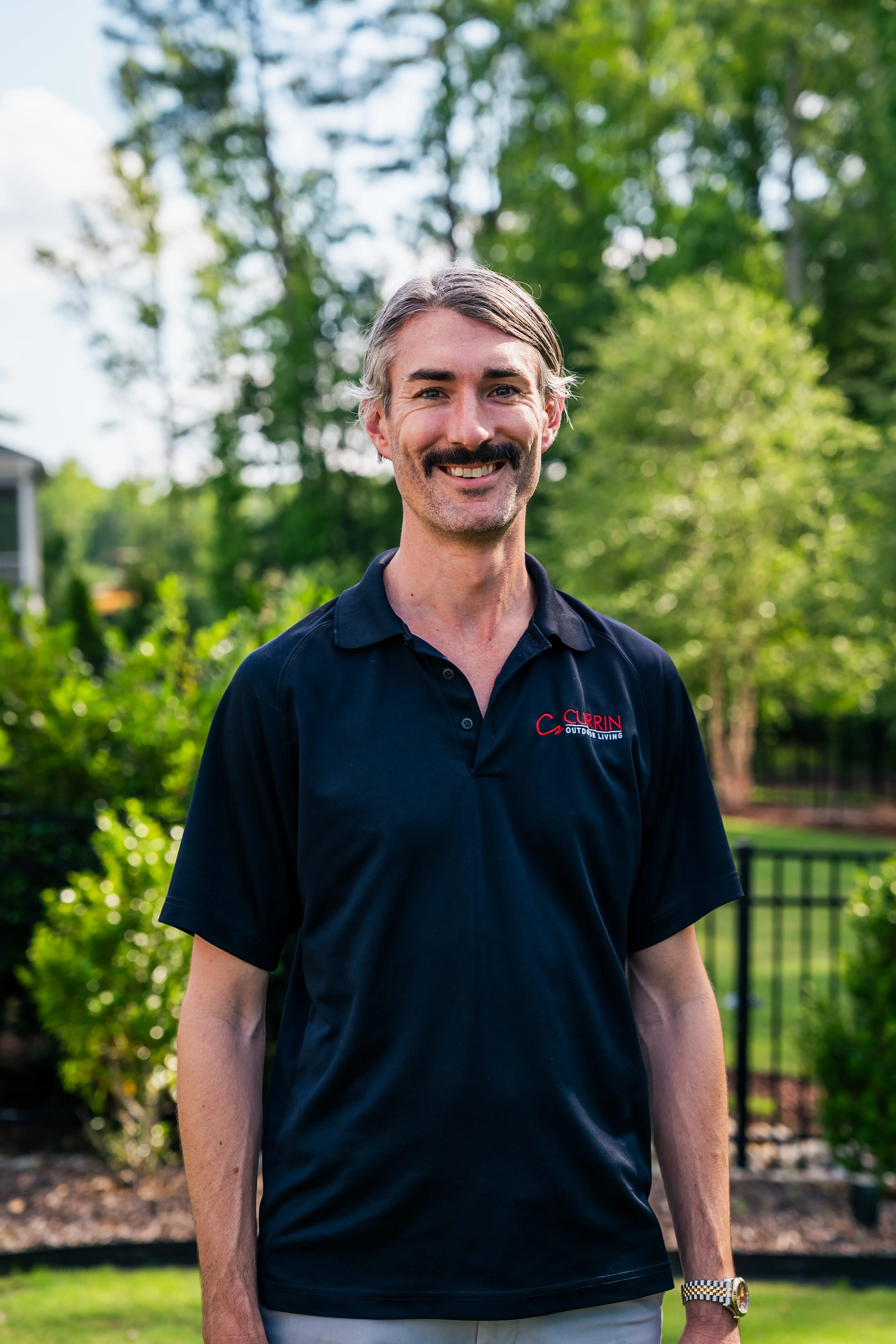 Jon Currin, founder of Currin Outdoor Living, a premier custom pool builder and backyard design expert in Raleigh, NC.