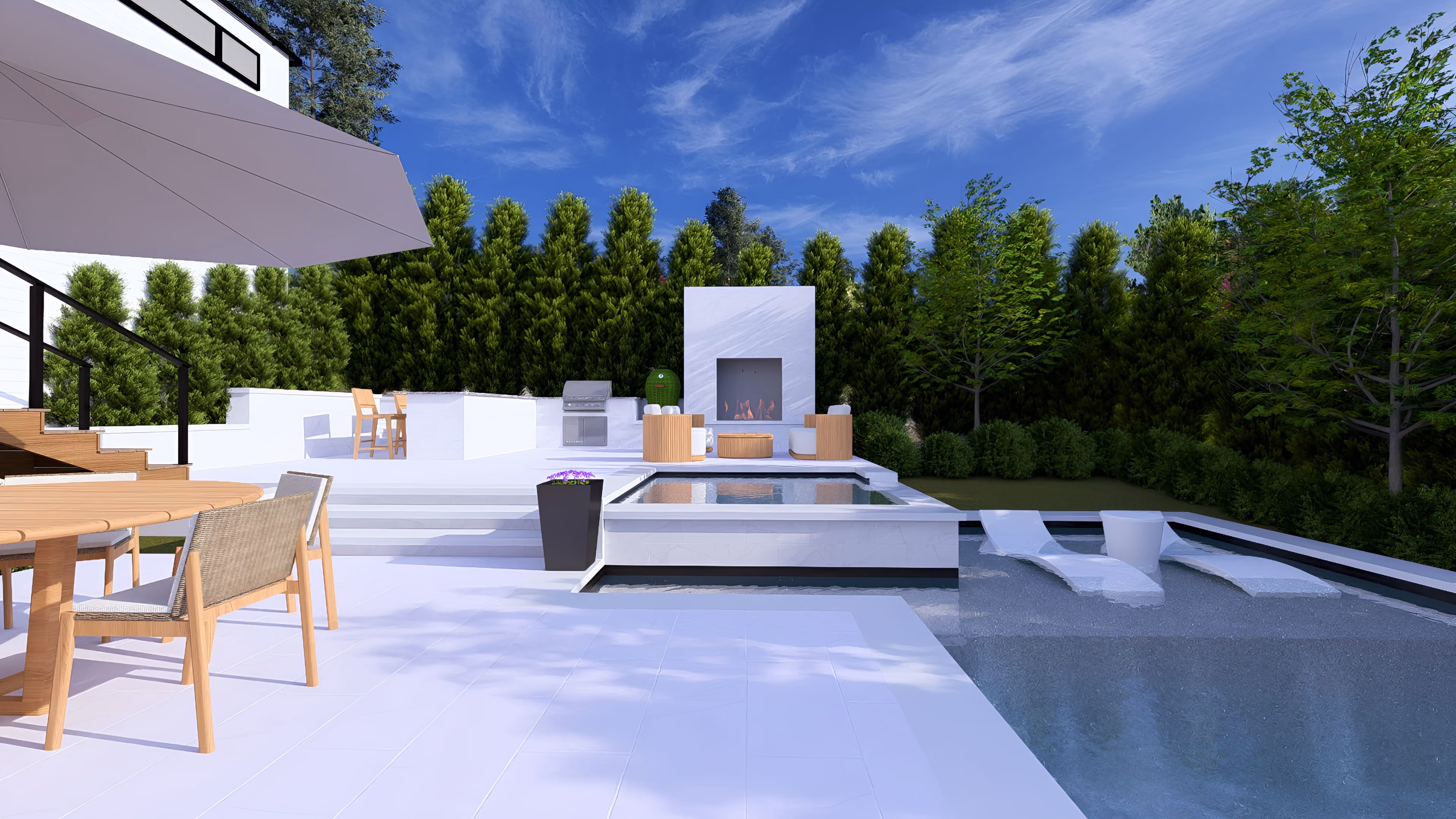 Ground-level daytime view of a luxury custom inground swimming pool featuring an integrated concrete spa, a modern stone paver patio with lounge seating, and professional backyard landscape design built by an outdoor living company in Raleigh, NC.