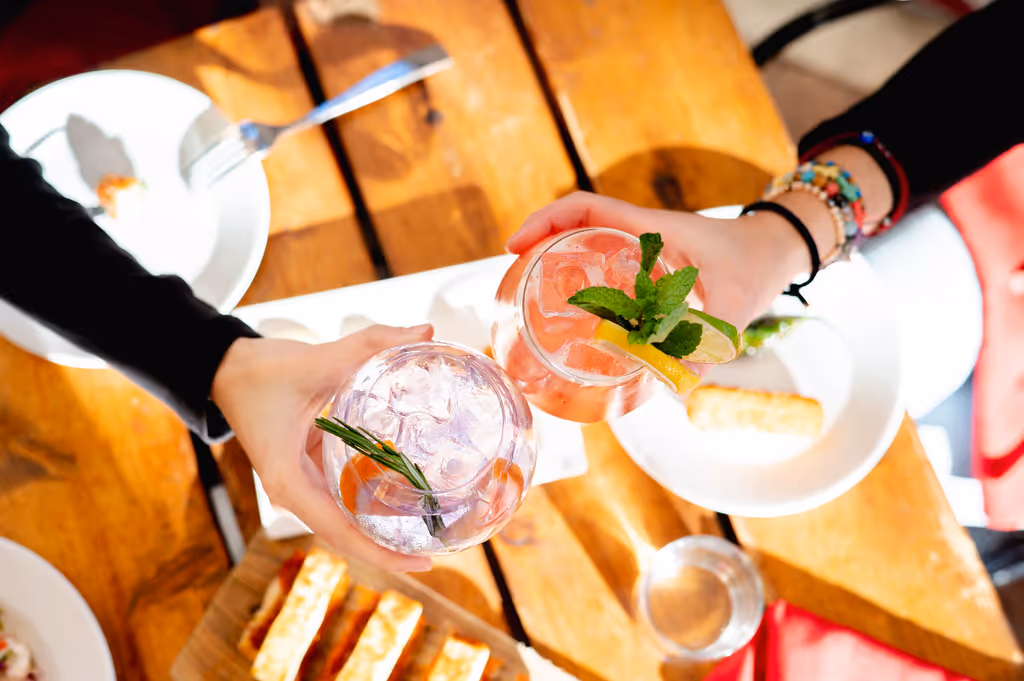 Cheers with Alcoholic Drinks at Toro Kitchen and Bar, in San Antonio Texas