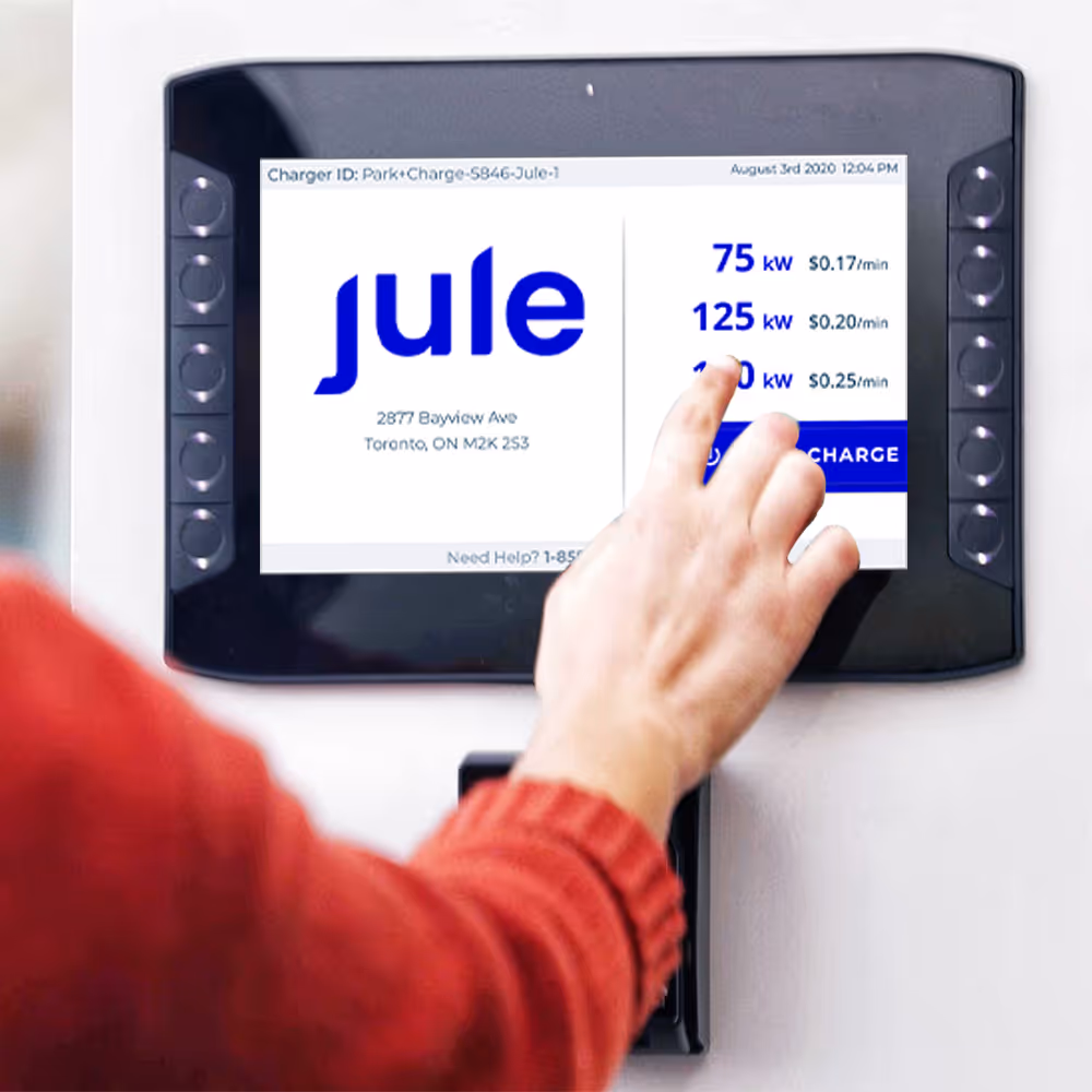 Person selecting their desired charging speed on Jule's touch display.