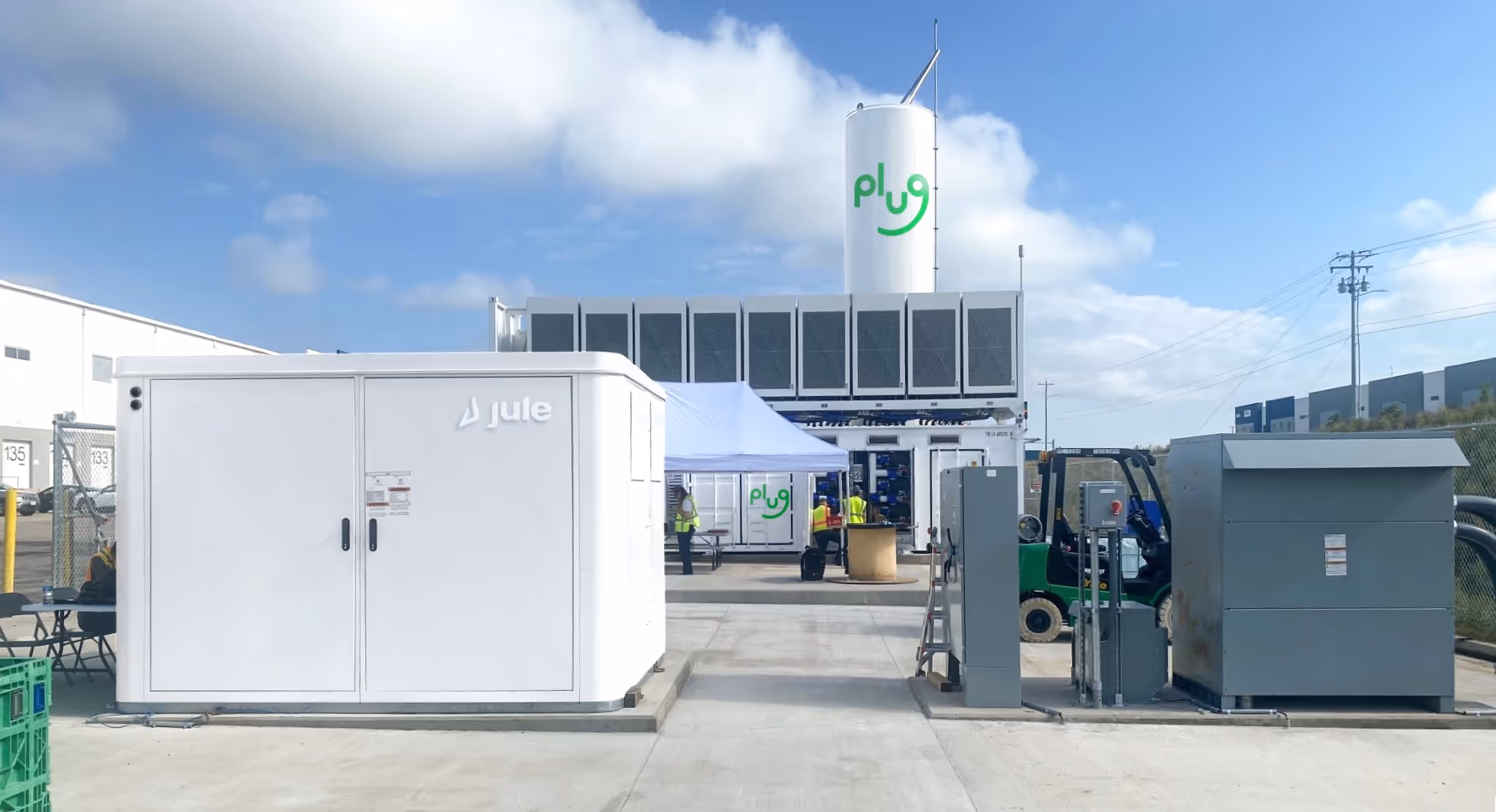 Jule's Battery Hub at a fleet facility in Alaska with mountains in the background. 